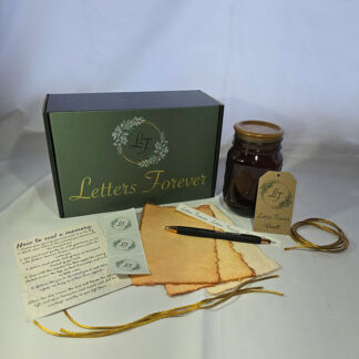 The “Memory Vault” gift box is shown in green with a brown jar, vintage paper, black-and-gold pen, gold cords, stickers, and a “How to seal a memory” instruction card—all arranged on a white background.